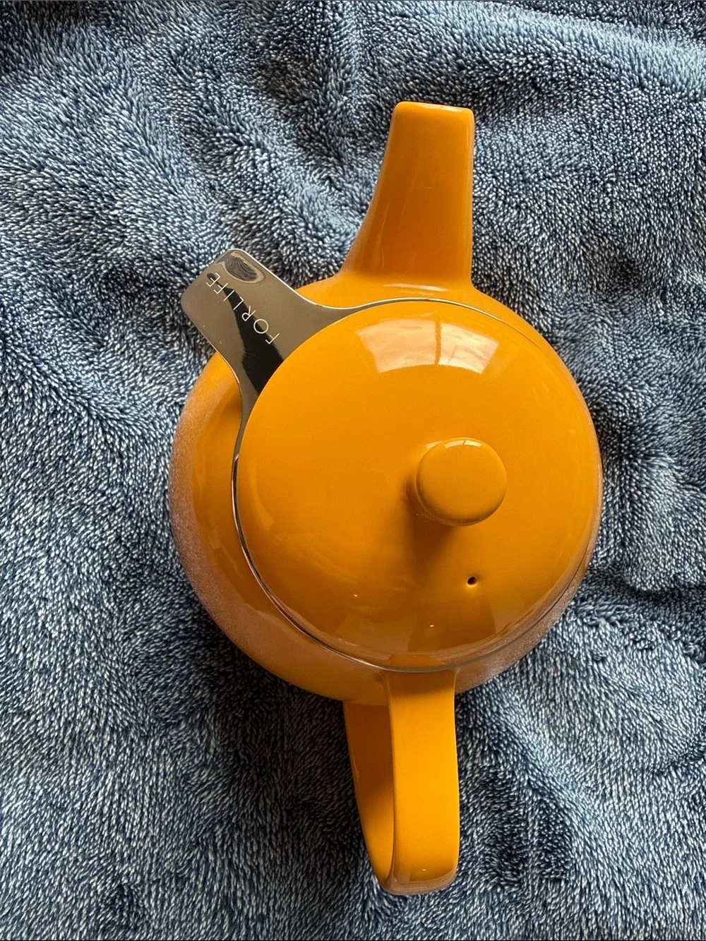 Bright Orange Ceramic Teapot with Round Silhouette